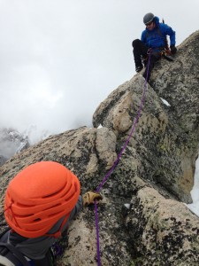 Josh Jackson belays in Ron Paproski  toward the summit of Disappointment Peak