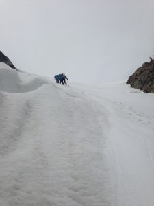 Sam Hennessy, short ropes up Spoon Couloir.