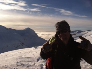 Student Evan psyched to summit Sol mountain.